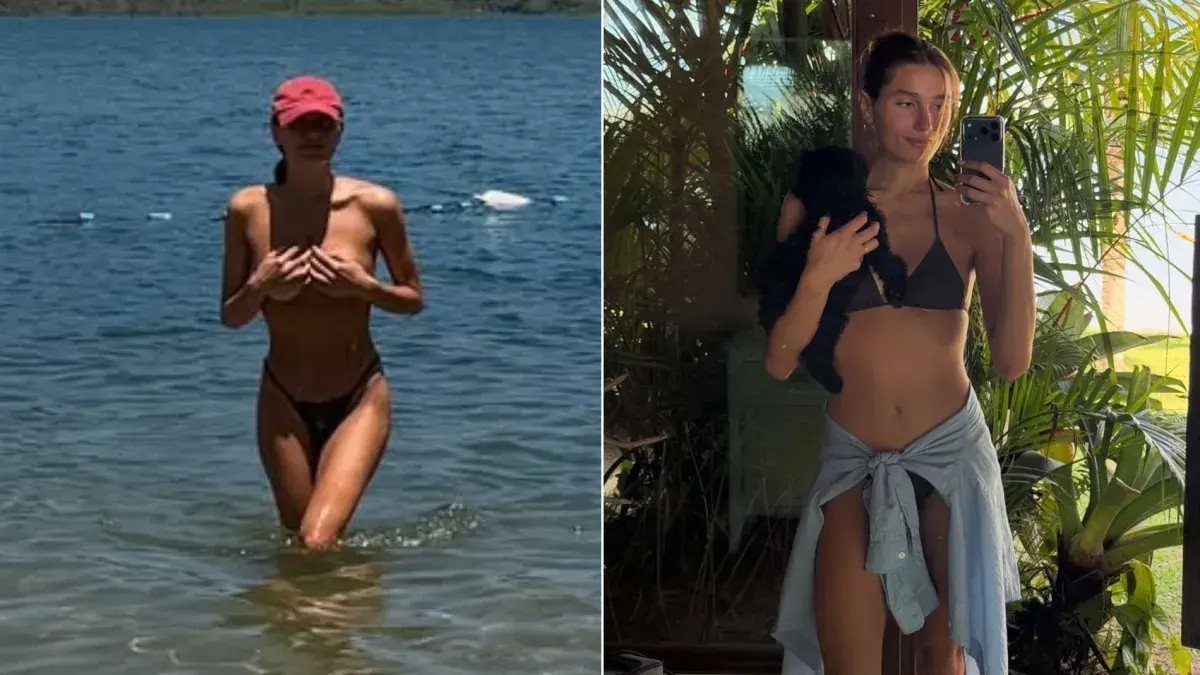 Sasha Meneghel faz topless na praia durante viagem em família