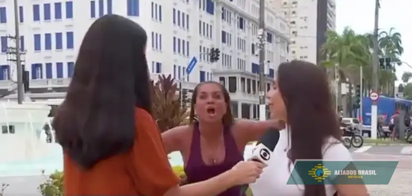 Mulher surge em transmissão ao vivo e grita “Globo lixo”