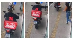 VÍDEO: Falso entregador em moto sobe na calçada e rouba celular de mulher na porta de loja em SP