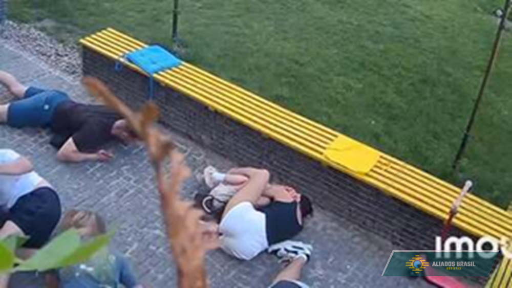 VÍDEO: Mulher viraliza após proteger menina durante bombardeio russo contra cidade na Ucrânia