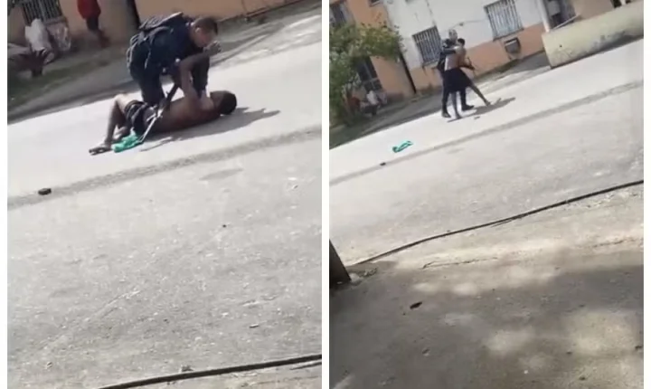 VÍDEO: Suspeito dispara fuzil de policial durante luta no meio da rua